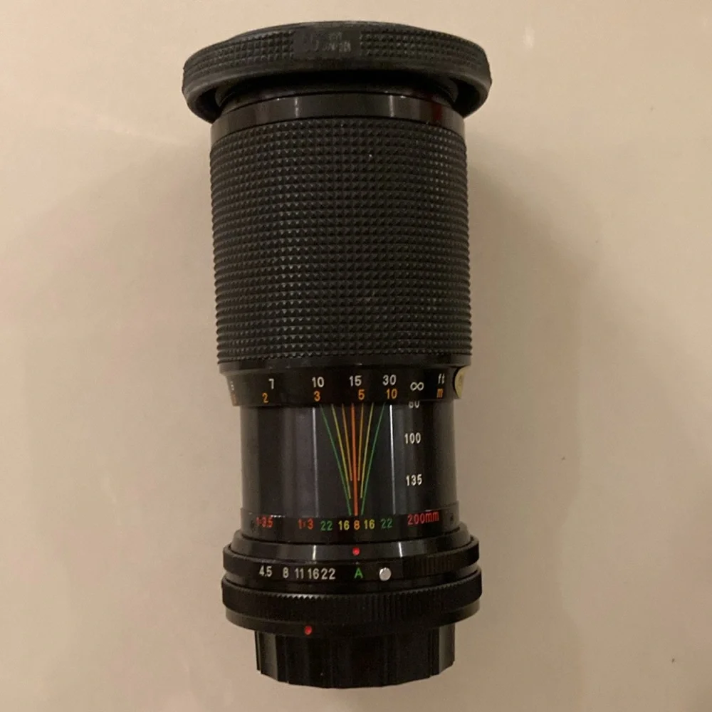 Vintage Canon Camera with additional lenses.